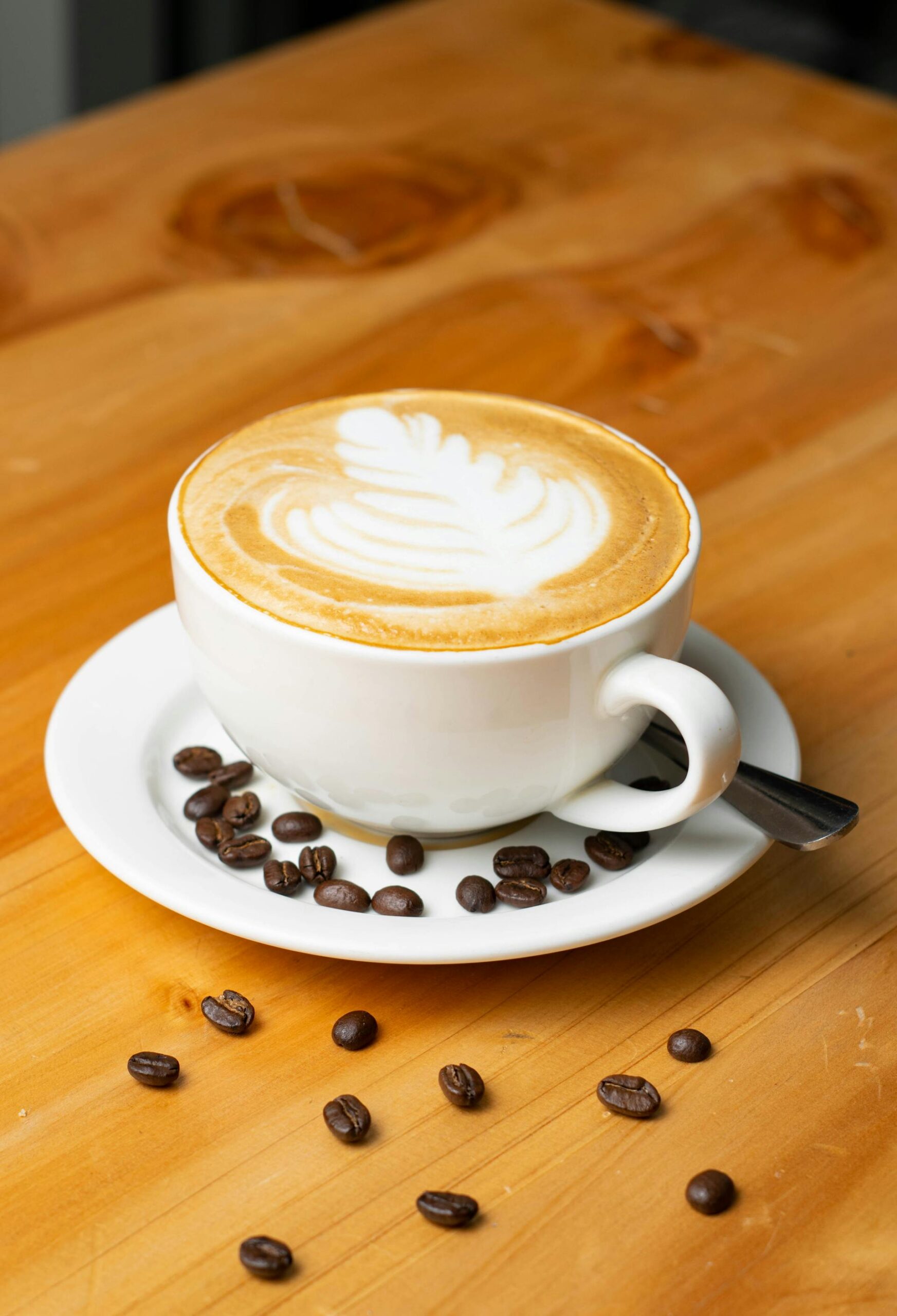 delicious cup of coffee in the morning with beans for grinding